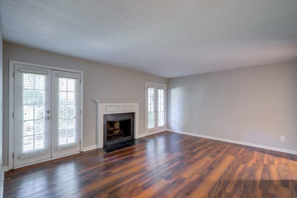 Spacious Room with a fireplace at The Lodge on the Chattahoochee Apartments in Sandy Springs, Georgia