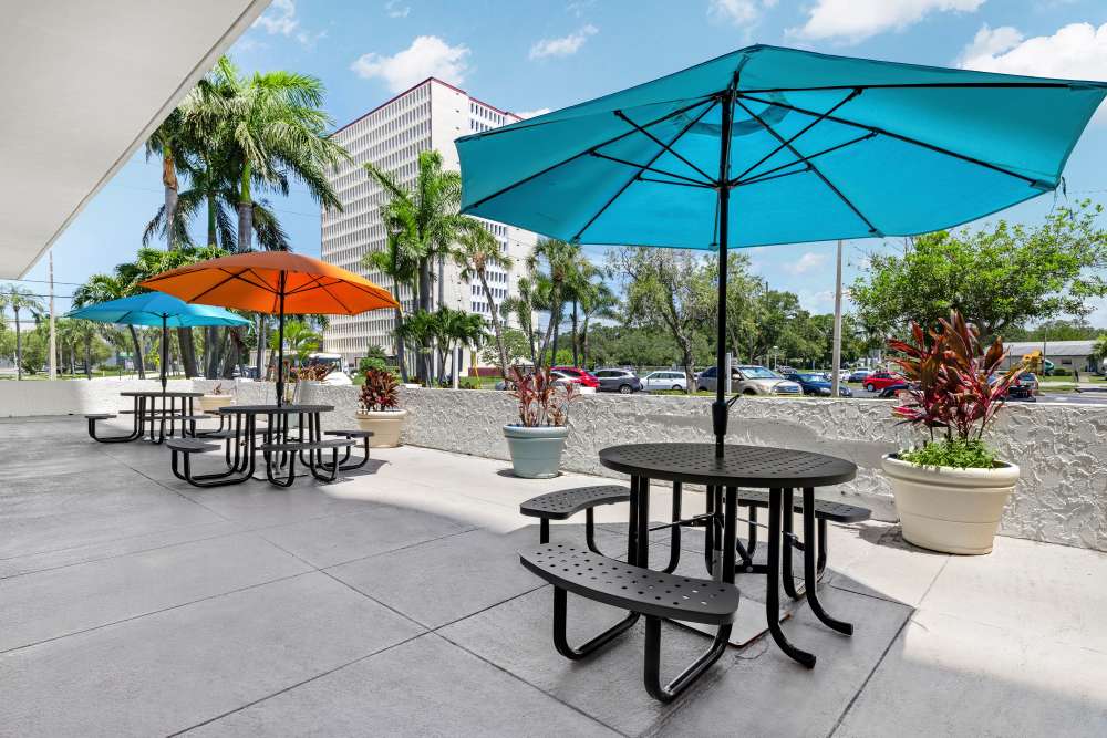 Outdoor patio seating at Bay Pointe Tower in South Pasadena, Florida