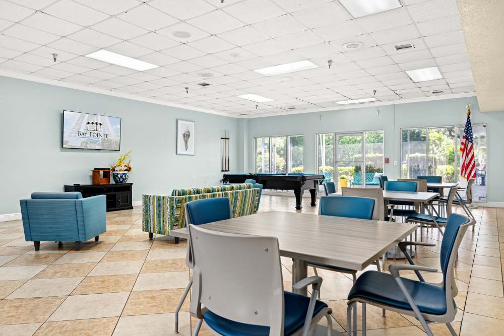 Community library with seating at Bay Pointe Tower in South Pasadena, Florida