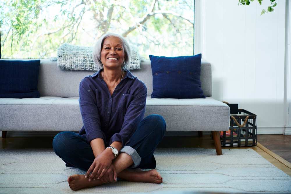 Resident practicing yoga at Watermere Highlands in Arlington, Texas