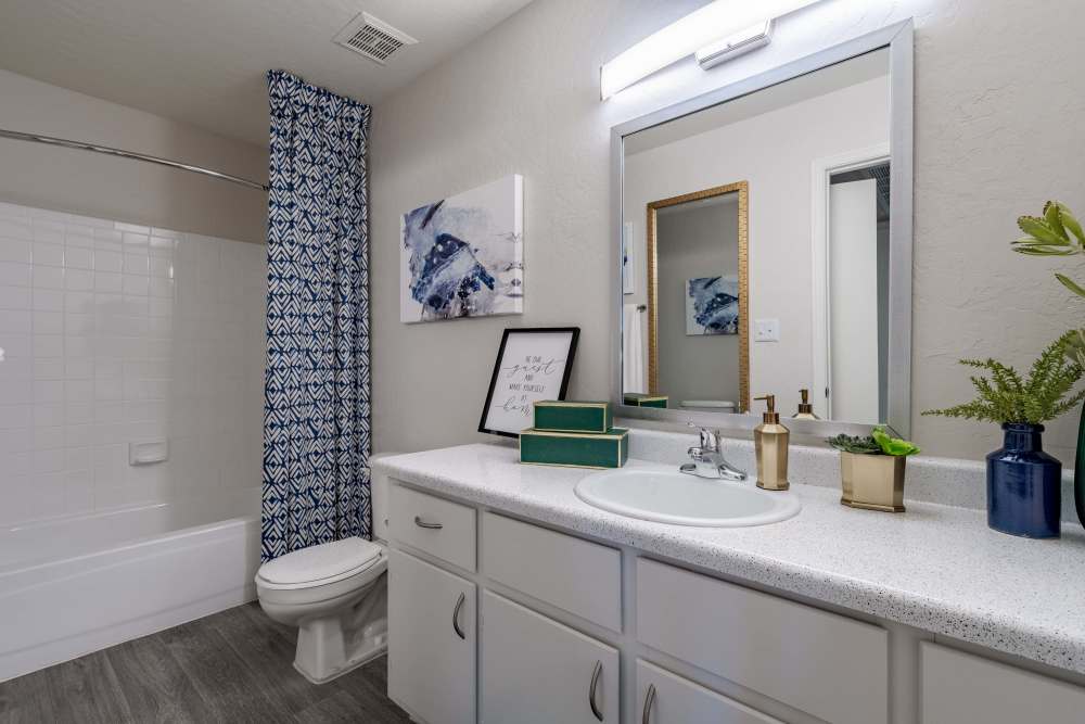 Moden bathroom with a large vanity mirror at Crestone at Shadow Mountain in Phoenix, Arizona