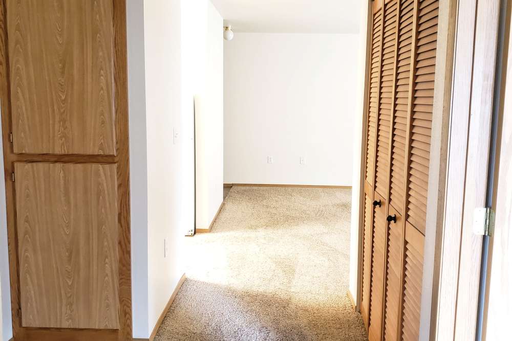 Walk-in closet area with quality wooden doors at Lake Wood Ranch in Coeur d'Alene,Idaho