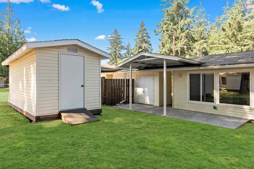Backyard with Covered Patio and Storage Shed