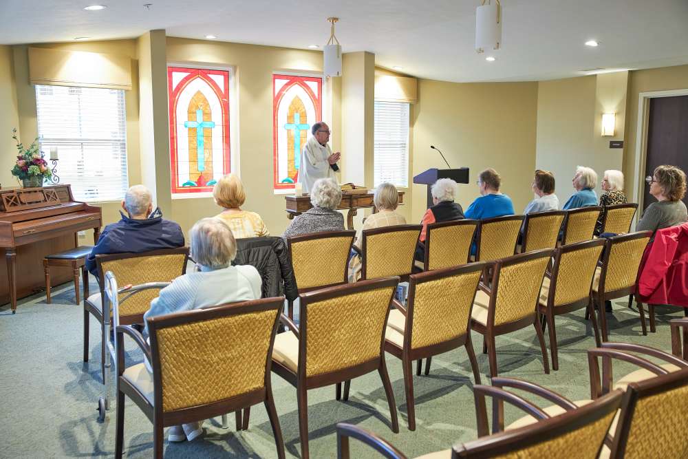 Residents gather in the chapel for a service at Legacy Living Defiance in Defiance, Ohio