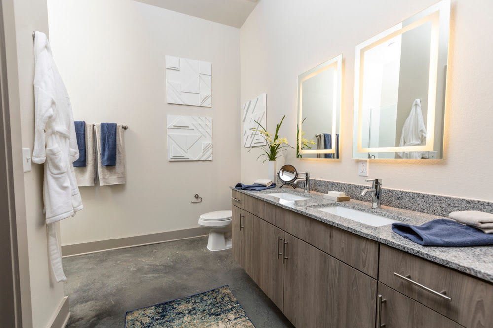 Bathroom with dual vanity and sinks in a model home at Beacon Station in Augusta, Georgia