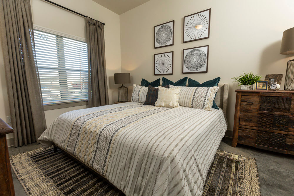 Cozy bedroom in a model home at Beacon Station in Augusta, Georgia