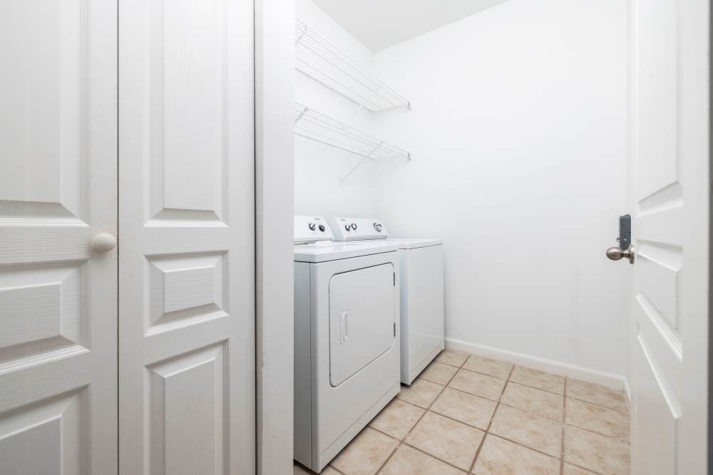 In-home washer and dryer units in a model home at The Grove at Oakbrook in Summerville, South Carolina