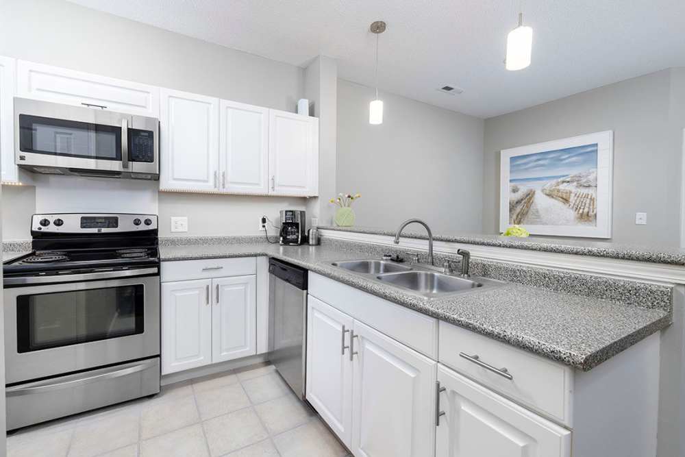 Kitchen with white cabinetry at Heron Reserve in Charleston, South Carolina