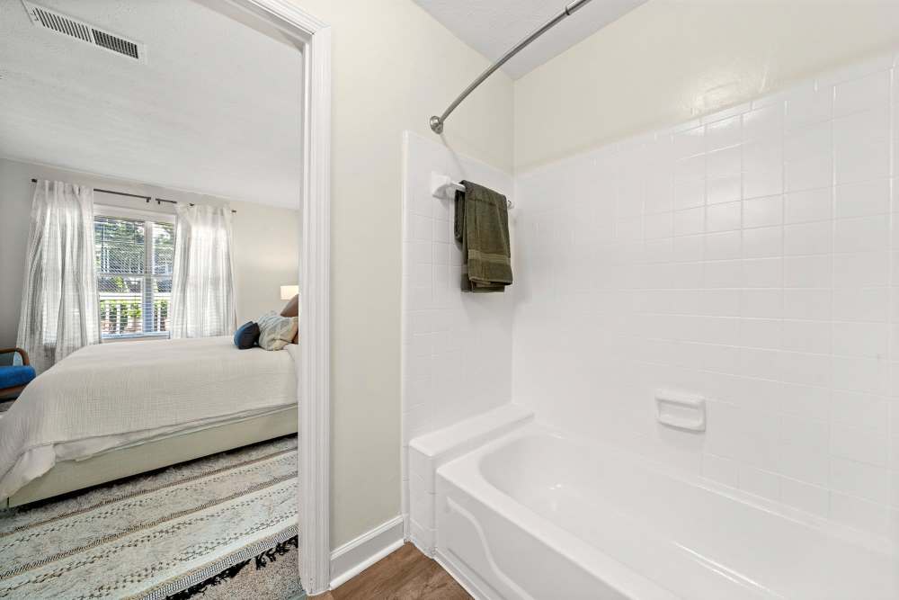 Bathroom with tub at The Seasons Apartments in Laurel, Maryland