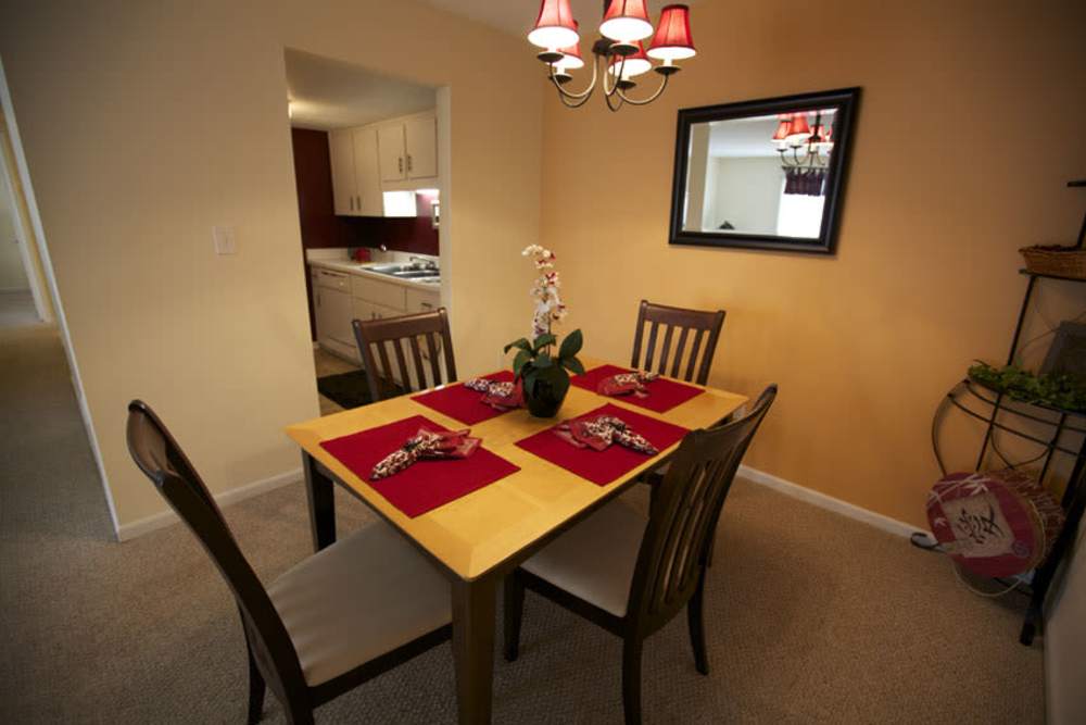 Dining room table in a model home at Cambridge Apartments in Athens, Georgia