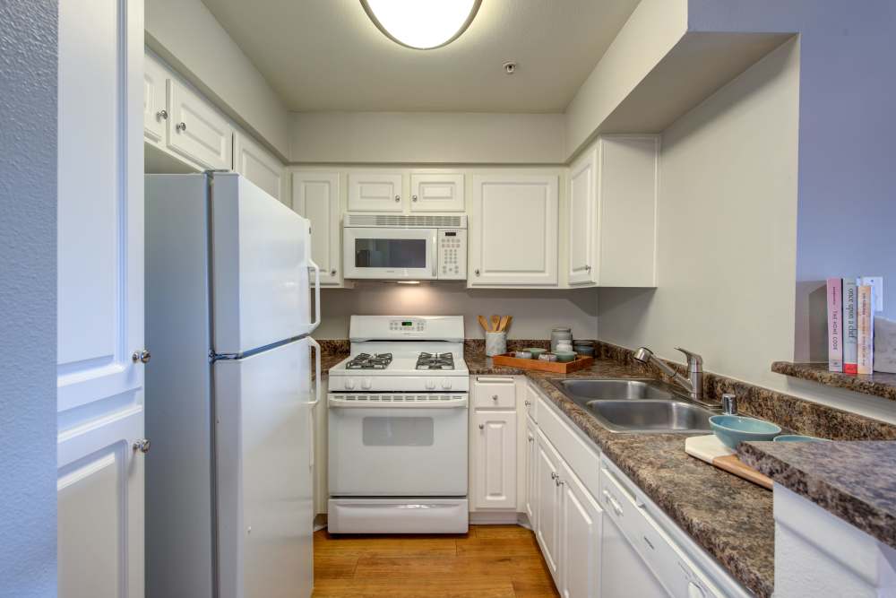 An apartment kitchen at Vue at Laurel Canyon in Valley Village, California