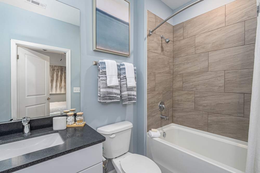 Bathroom with large bathtub in a model home at The Addie in Savannah, Georgia