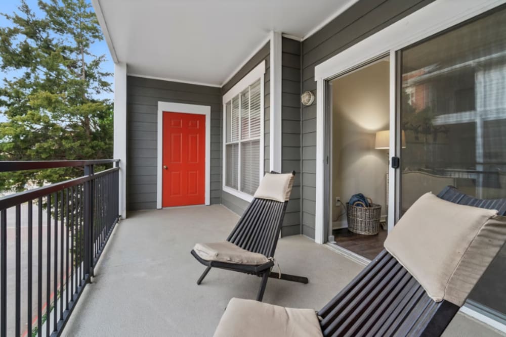 Balcony with seating at Flatiron District at Austin Ranch in The Colony, Texas