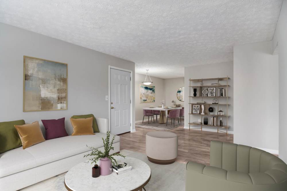Wood-style flooring in an apartment living room at Affinitee at Pine Lake in Stone Mountain, Georgia