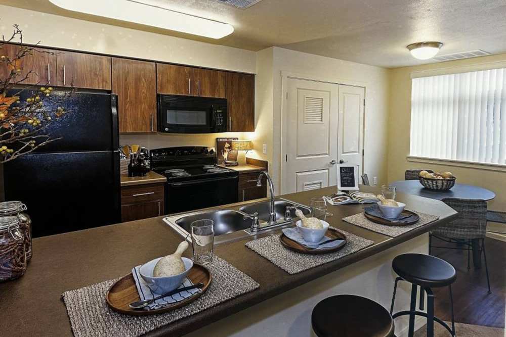 Kitchen with appliances at Copper Wood in Lacey, Washington