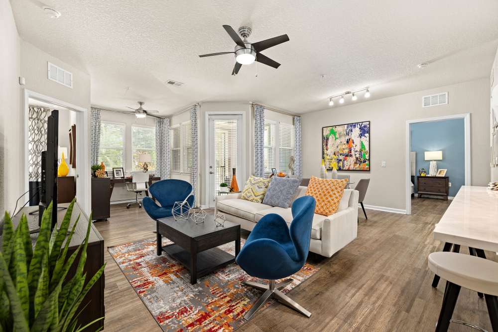 Fully furnished apartment living room at Art Avenue Apartment Homes in Orlando, Florida