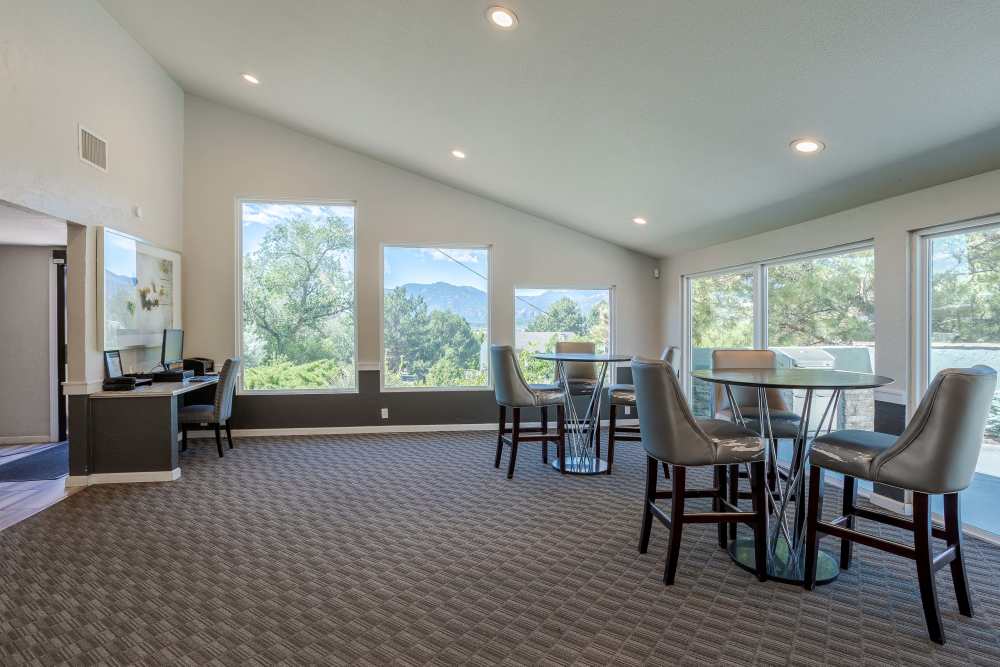 A Cozy Reception Lounge Area at The Knolls at Sweetgrass Apartment Homes in Colorado Springs, Colorado.