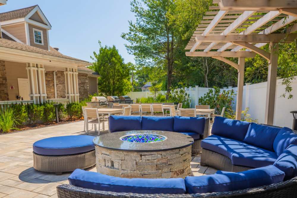Exterior seating area with firepit Villas at Old Concord in Billerica, Massachusetts