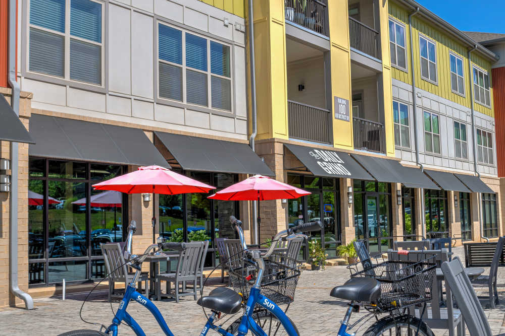 bikes and outdoor cafe seating near The District in Asheville, North Carolina