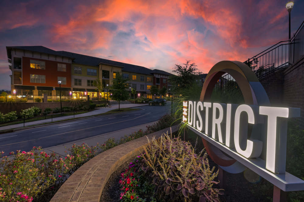 evening view of front entrance and sign at The District in Asheville, North Carolina