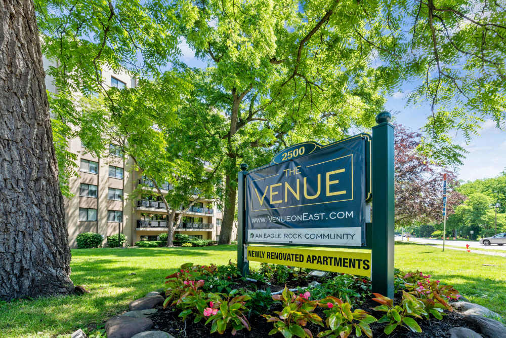 Urban living with a view of balconies and trees in front at The Venue in Rochester, New York