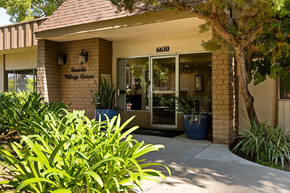 Green lawn outside of leasing office at Reseda Village Green in Reseda, California