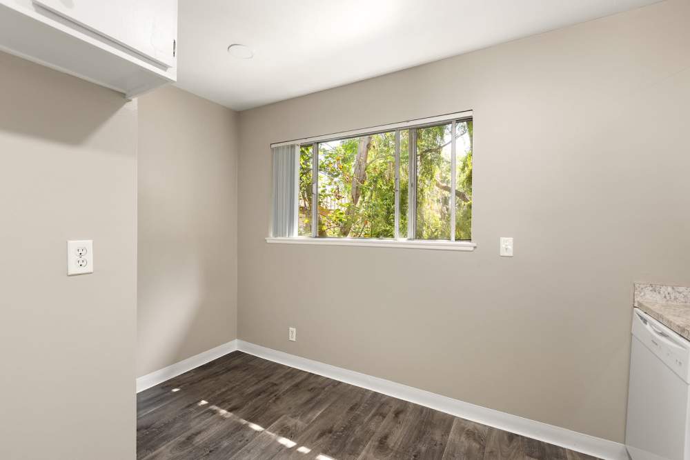 Dining room with close access to fully-equipped kitchen at Reseda Village Green in Reseda, California
