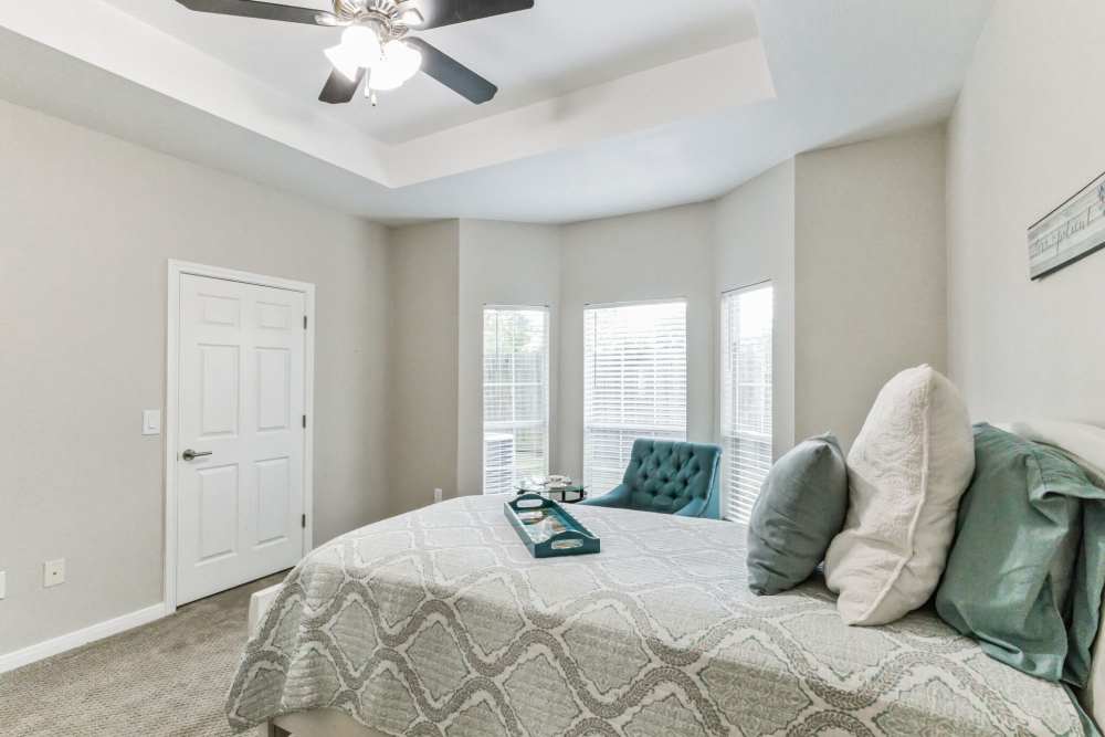 clean and refreshing bedroom to Carriage Inn Katy in Katy, Texas