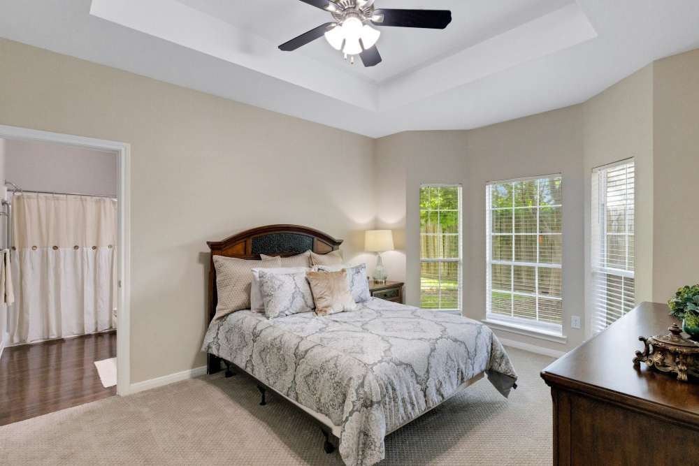 Comfy bedroom area to Carriage Inn Katy in Katy, Texas