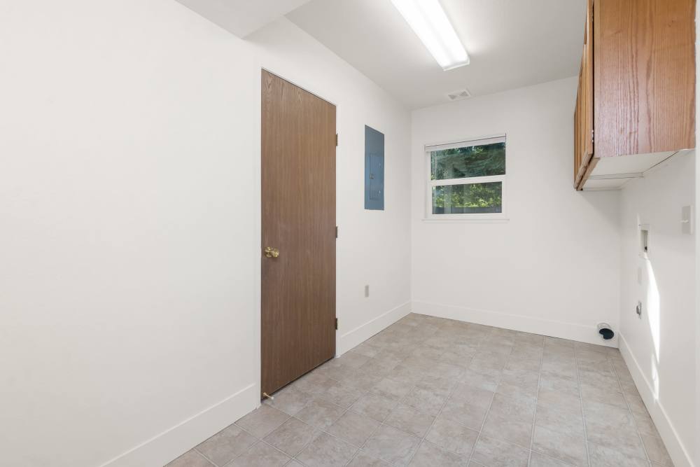Laundry room with storage