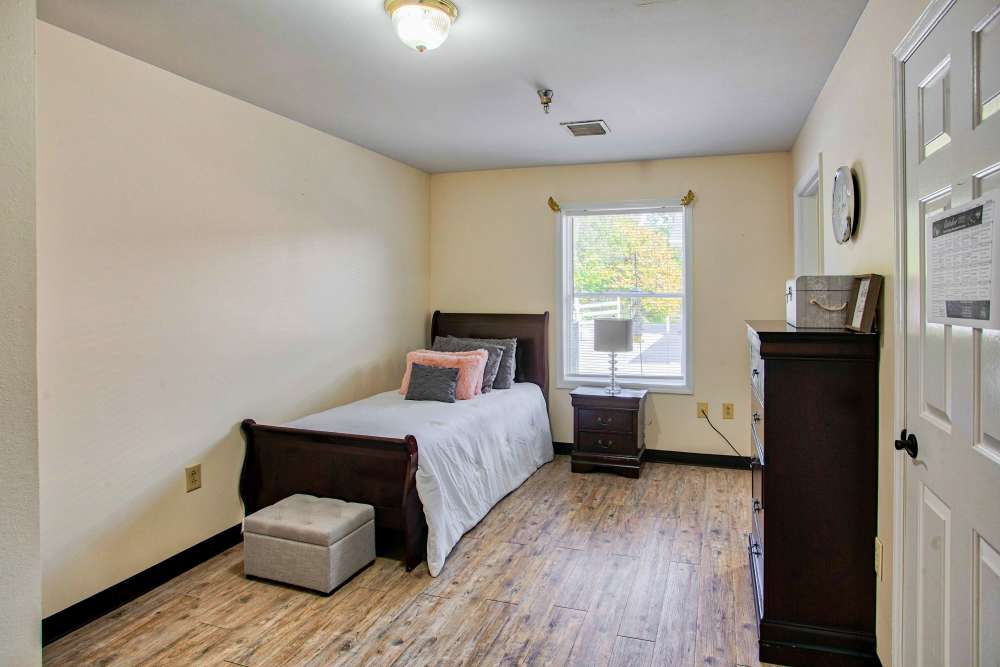 Bedroom with window Clemmons Village Assisted Living and Memory Care in Clemmons, North Carolina