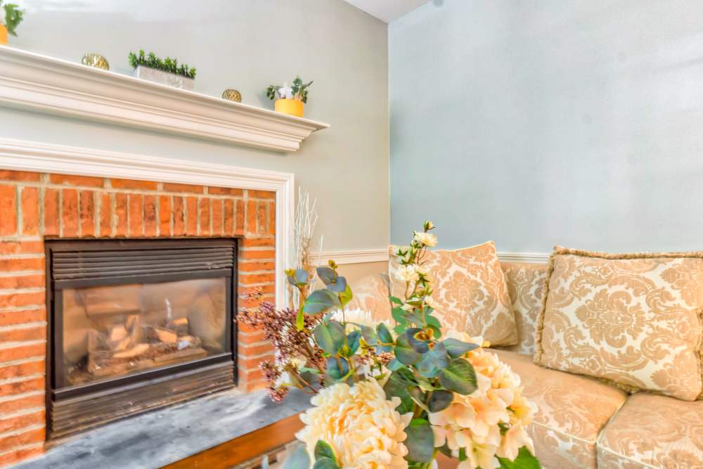 Seating next to a fireplace The Little Flower Assisted Living in Charlotte, North Carolina