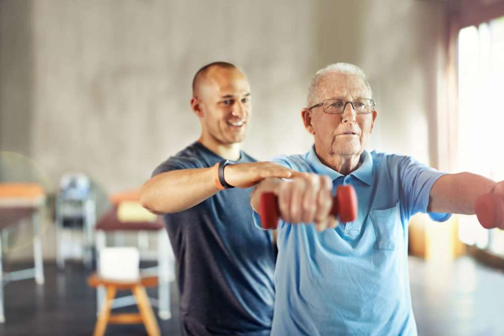 Technician helping Resident with Physical Therapy at The Barclay in Charlottesville, Virginia