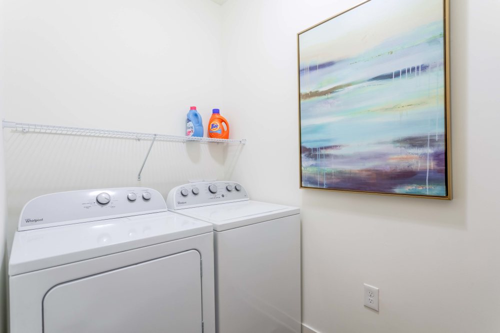 In-unit laundry room with washer and dryer at Springfield Apartments in Murfreesboro, Tennessee