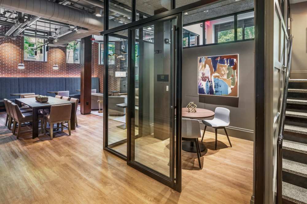 Work spaces in the clubhouse at Atrio Boston in Boston, Massachusetts