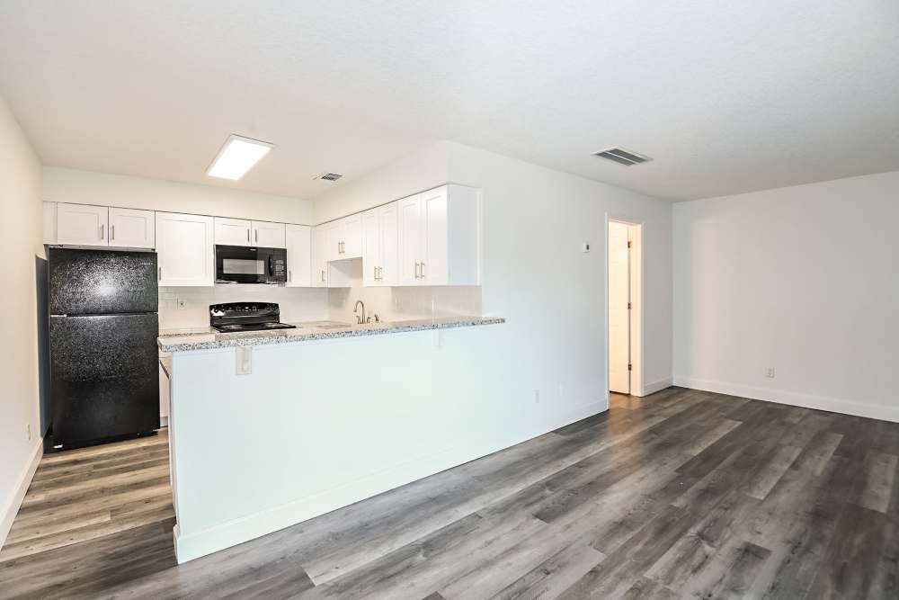 Wood-style flooring in an apartment at Woodlake Villas in Orlando, Florida