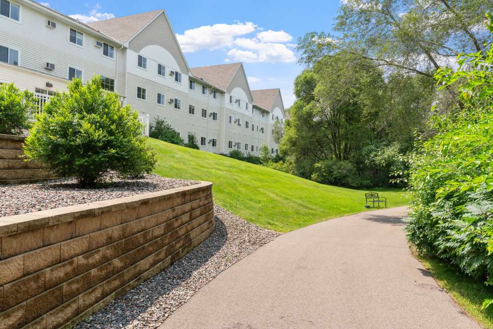 Apartment pathway at Amira Choice Champlin in Champlin, Minnesota