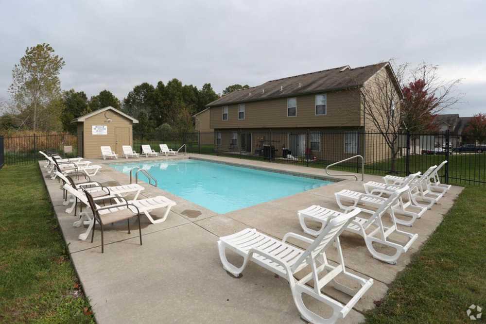 View of swimming pool with sundeck at Cross Creek Villas in Columbia, Missouri, 