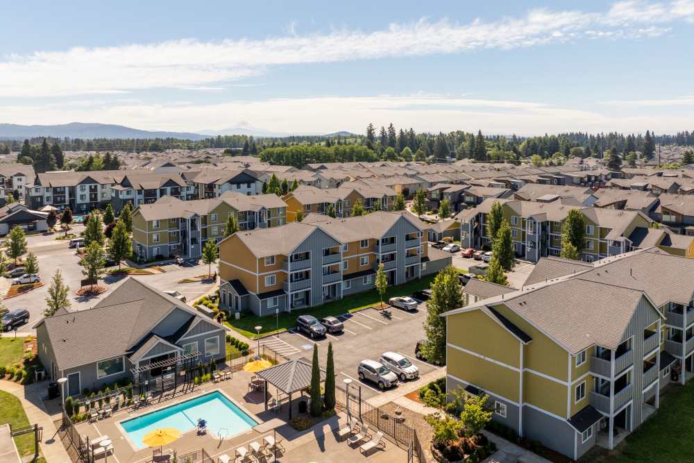 View of community swimming pool and buildings at Rock Creek Commons in Vancouver, Washington