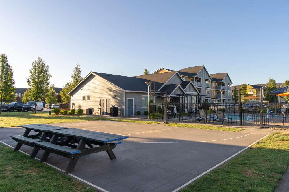 Play space with picnic tables at Rock Creek Commons in Vancouver, Washington