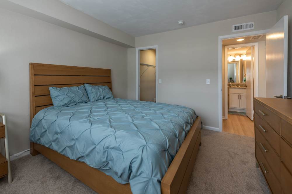 Cozy carpeted bedroom at Attain at Chic’s Beach, Virginia Beach, Virginia