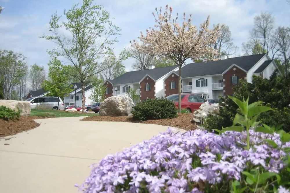 Lots of grass, walking paths and beautiful flowers around the community at Forest Ridge in Bloomington, Indiana, 