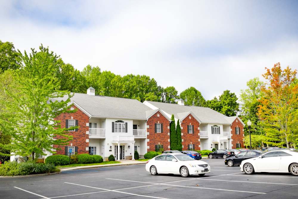 Charming community with lots of space for car parking and surrounded by trees at Forest Ridge in Bloomington, Indiana, 