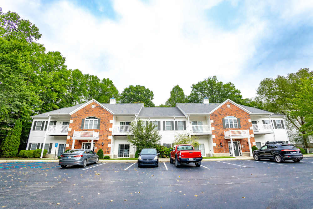 Exterior view of community with outdoor parking at Forest Ridge in Bloomington, Indiana, 