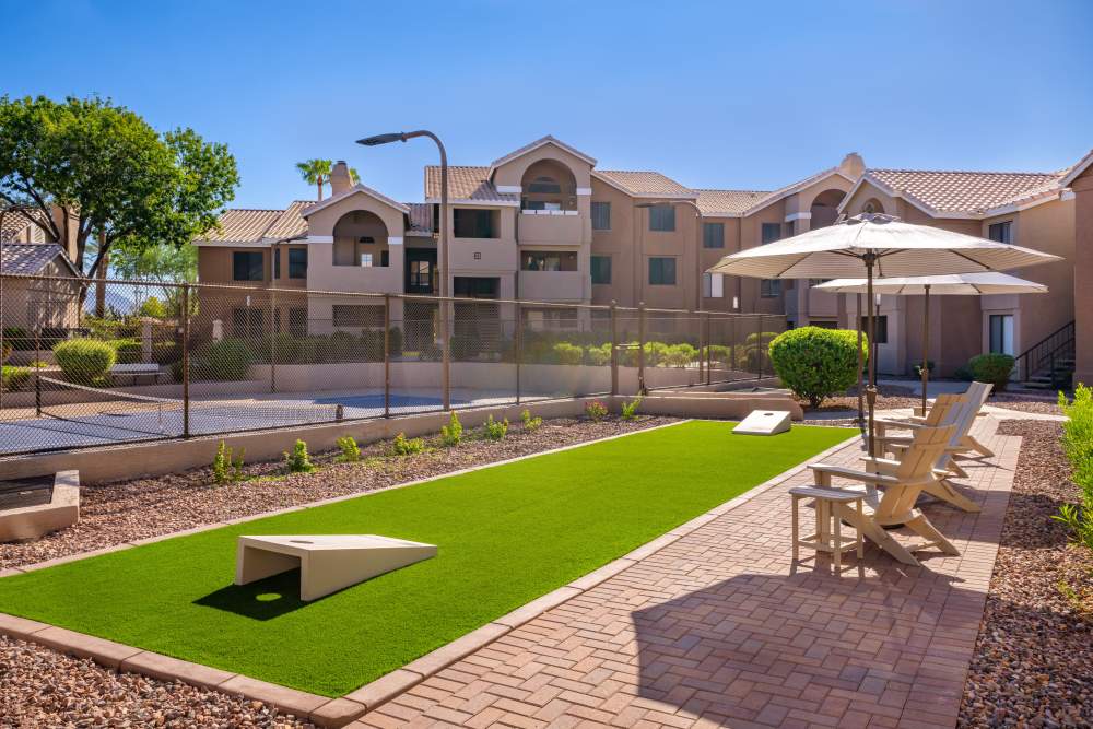 Cornhole game at at The Palisades in Paradise Valley | Apartments in Phoenix, Arizona