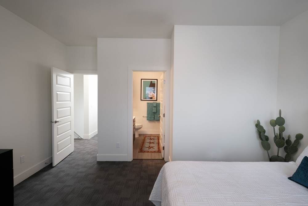 Well-lit and spacious bedroom with own bathroom at 27 Elm in Redmond, Oregon, 