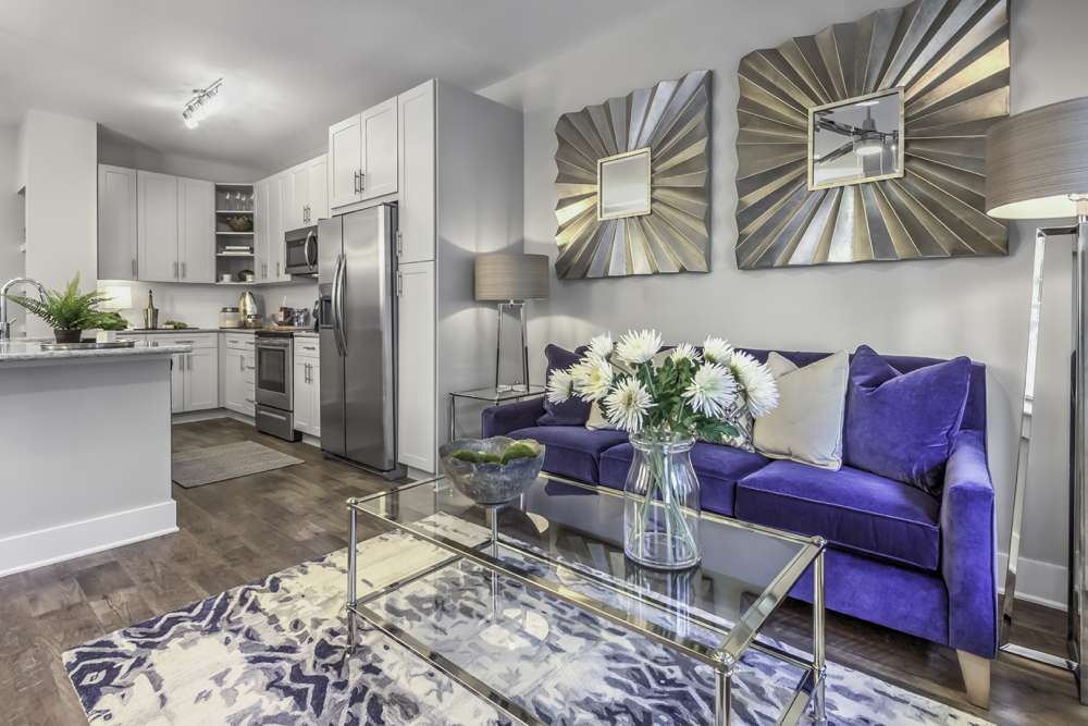 View of the living room with a couch and a coffee table at Greenside in Charlotte, North Carolina