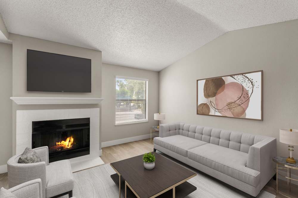 Living area with fireplace and sofa at Cielo on Gilbert in Mesa, Arizona