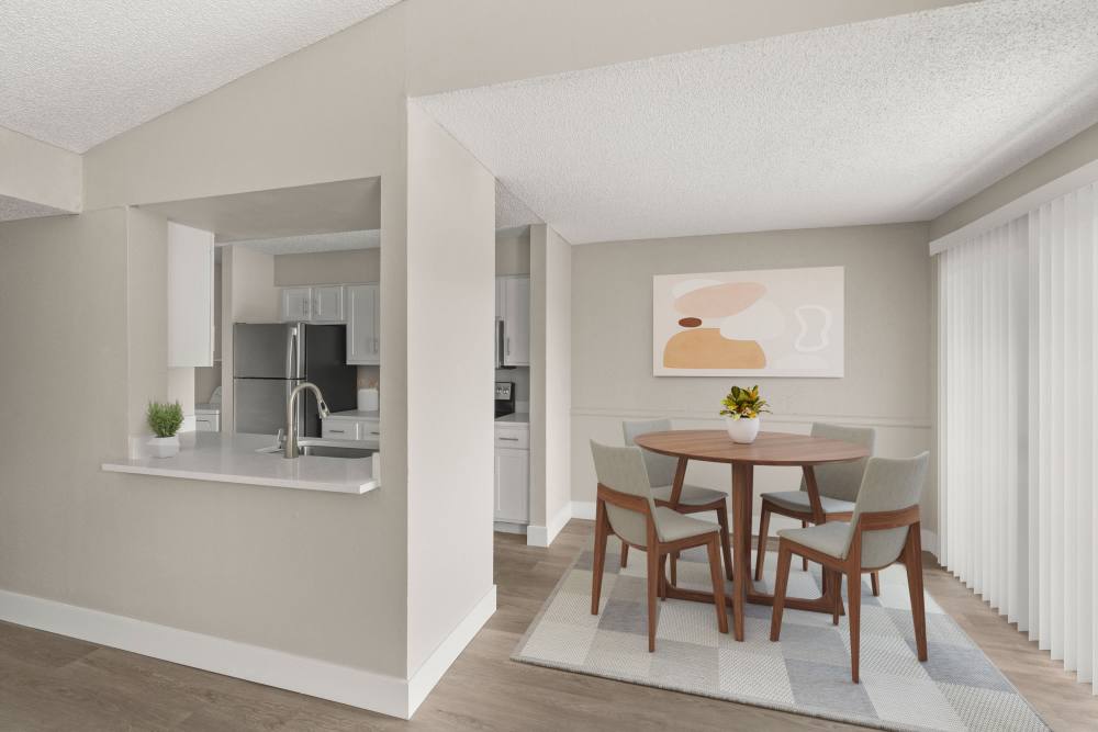 Model unit dining area and kitchen at Cielo on Gilbert in Mesa, Arizona