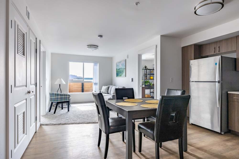Photo showing Kitchen and Dining Room into Living Room Traditions at Hazelwood in Portland, Oregon